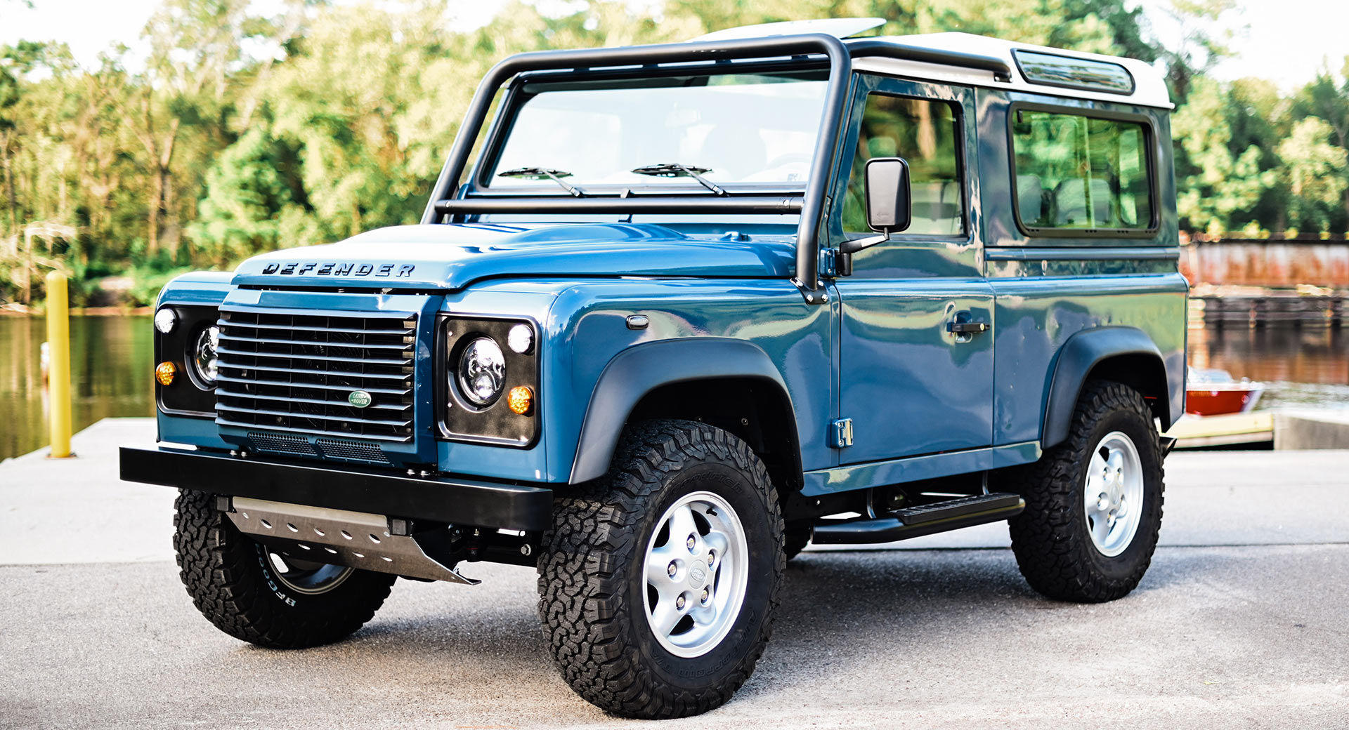 A Land Rover Defender stands tall and proud in this captivating image.