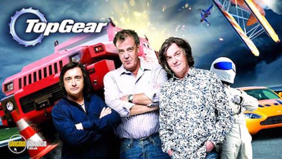 The iconic British television show 'Top Gear' UK Original logo, featuring stylized text in red and white against a black background. The logo showcases the show's name with a dynamic font, emphasizing its energetic and exciting nature. The recognizable emblem has become synonymous with the popular automotive program, known for its entertaining hosts, thrilling car reviews, and humorous challenges.