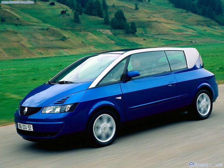 Renault Avantime: A side view of the avant-garde vehicle, showcasing its unique and daring design with a sloping roofline, elongated rear end, and pillarless doors.