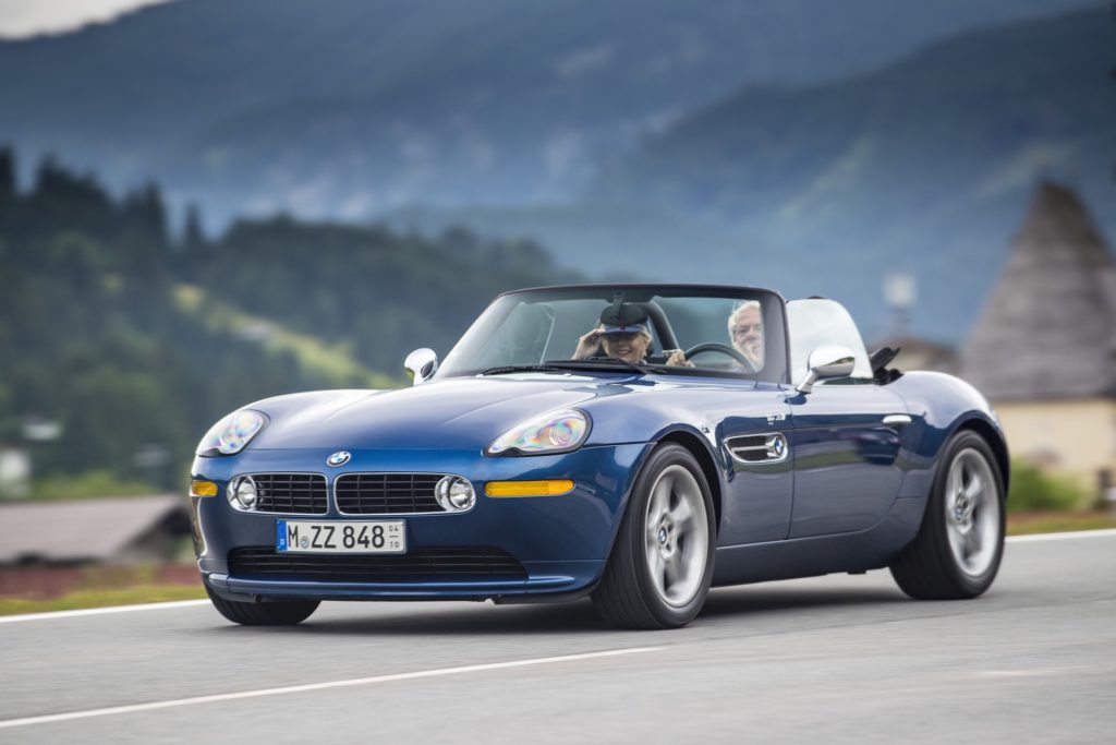 BMW Z8 parked on a scenic road, showcasing its sleek and classic design.