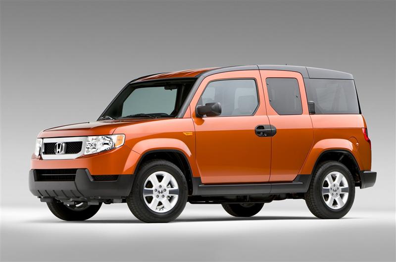 An image of a Honda Element, showcasing its distinctive boxy design, spacious interior, and rear-hinged 'suicide' doors.