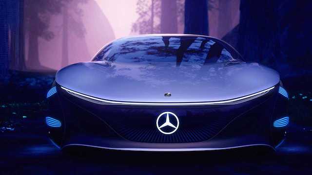 Image of the Mercedes Vision AVTR, a futuristic concept car with an aerodynamic, organic design, showcasing sustainable mobility through its electric propulsion system and innovative biometric features.