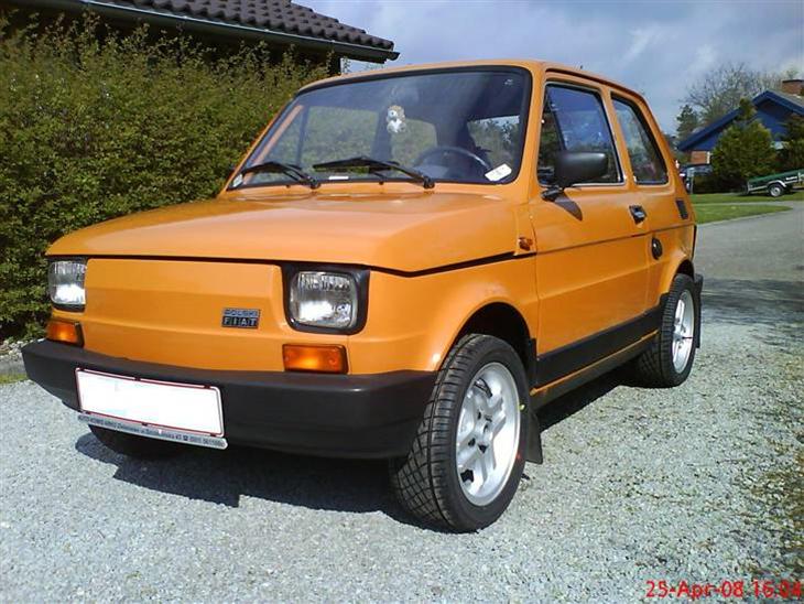 Image of a classic Fiat 126p, a small compact car with a vintage design, known for its compact size and iconic styling.